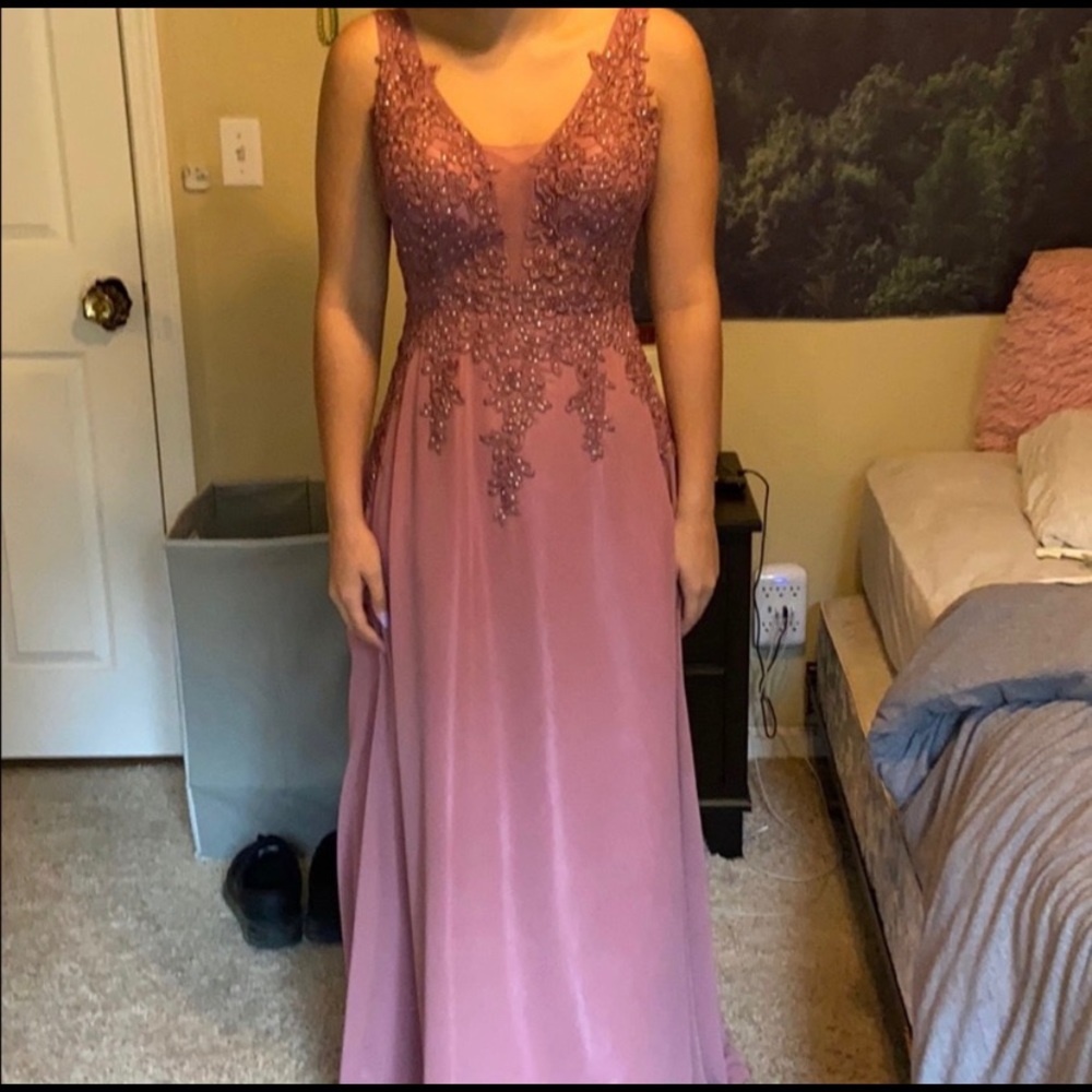 Used once mauve prom dress. Size 7 Juniors.